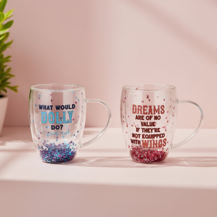Two mugs with motivational quotes on a light surface with a blurred natural background