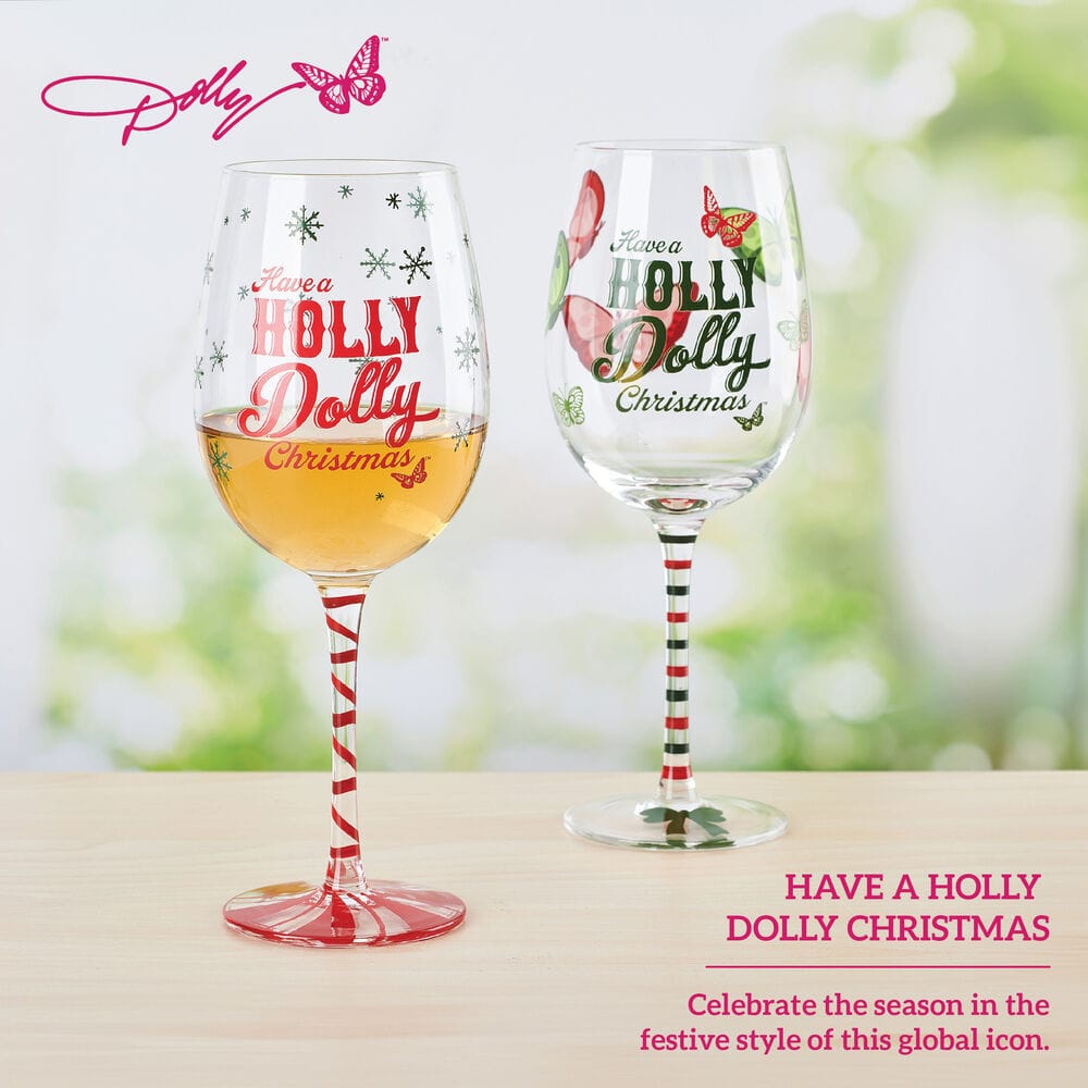 Set of two Holly Dolly Christmas wine glasses with red and green striped stems, one glass filled with wine