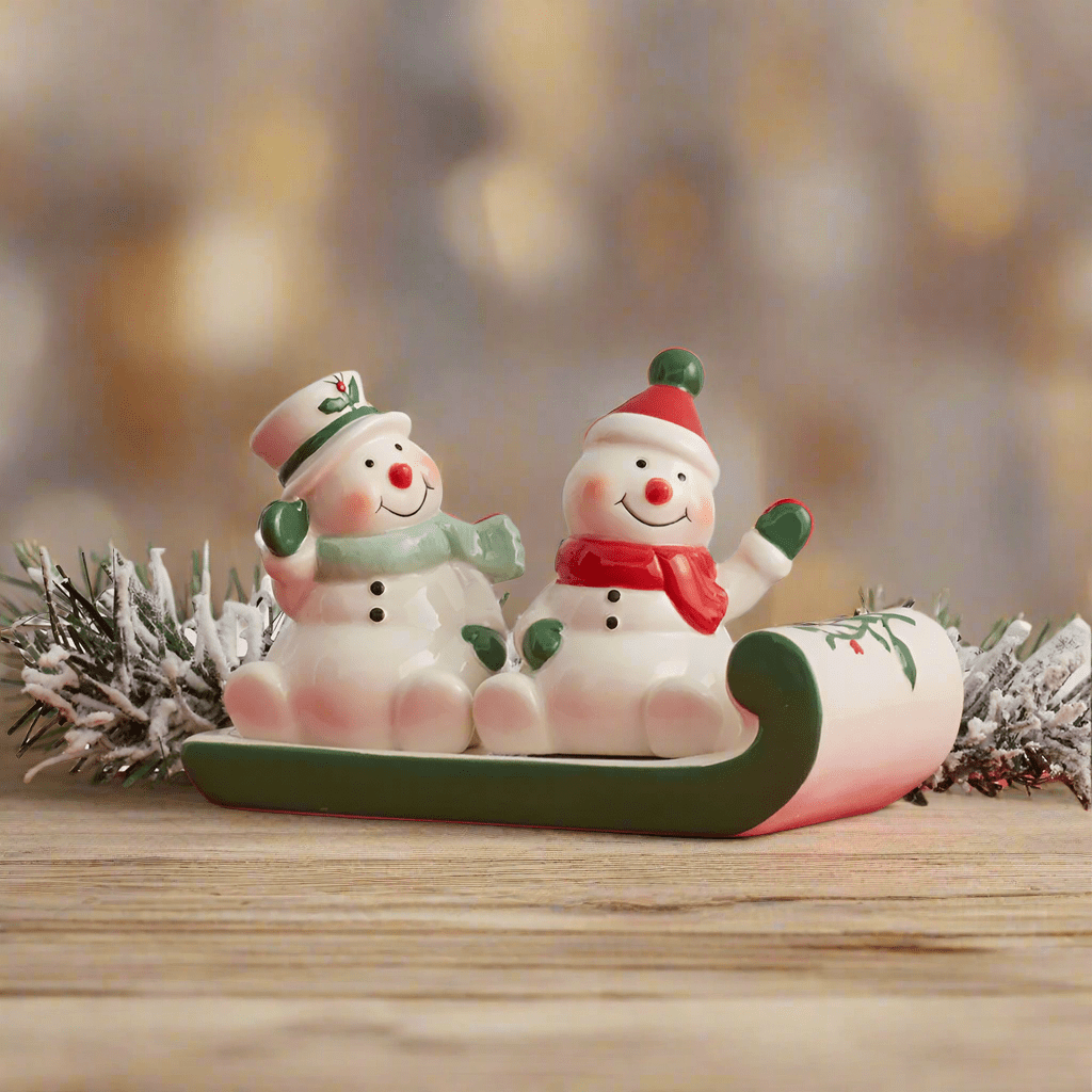 Winterberry® Snowmen On Sled Salt And Pepper Set