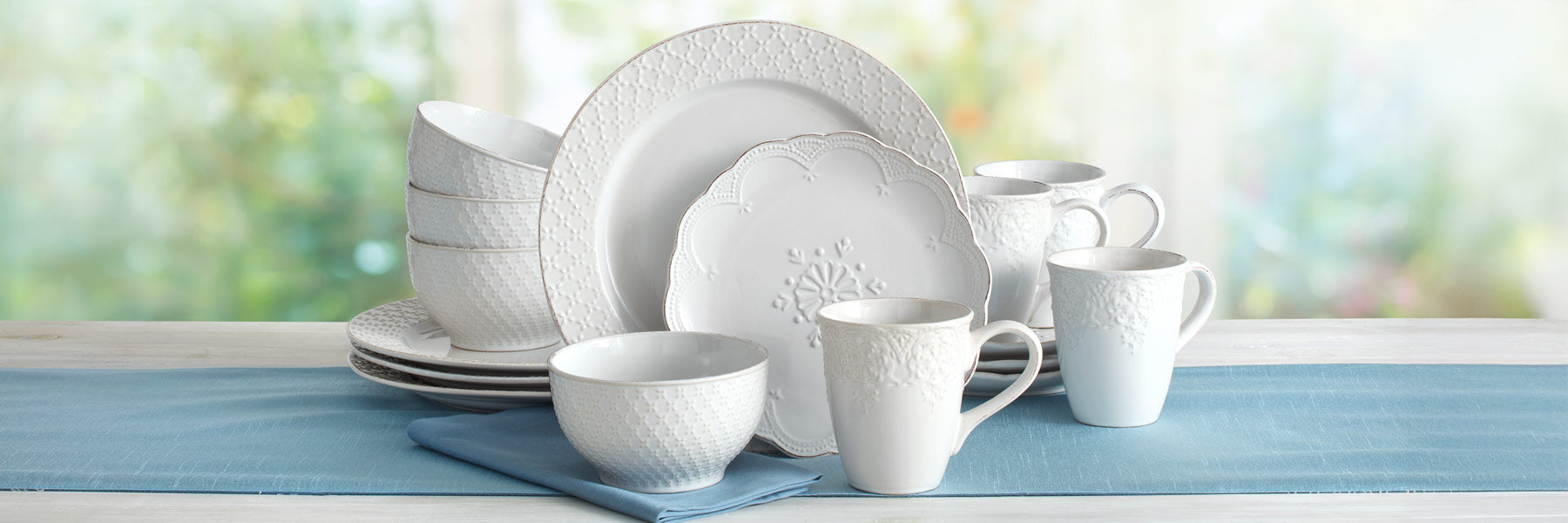 With its mix of bead, medallion, and diamond designs on slightly weathered white or green, the French Lace collection has the look of delicate antique lace.