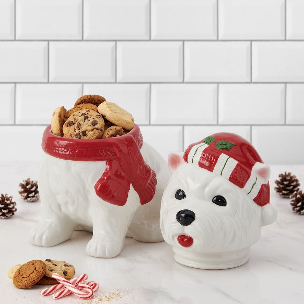 Westie cookie jar  with cookies and  head lid on a white marble surface with candy canes around